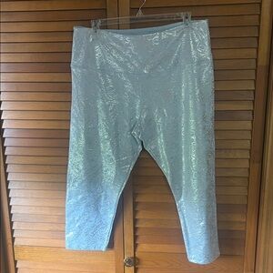 Shimmering Light Blue with Silver Metallic Floral Design Capri Leggings.